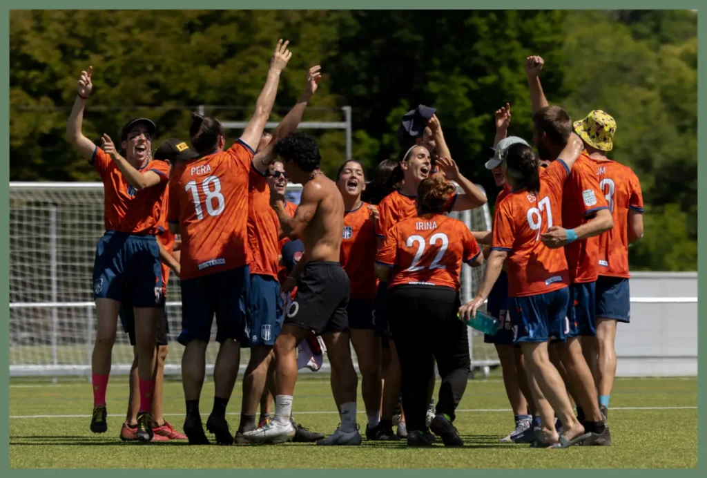 A group of smiling athletes celebrating together, captured by your sports photographer in Lyon. 