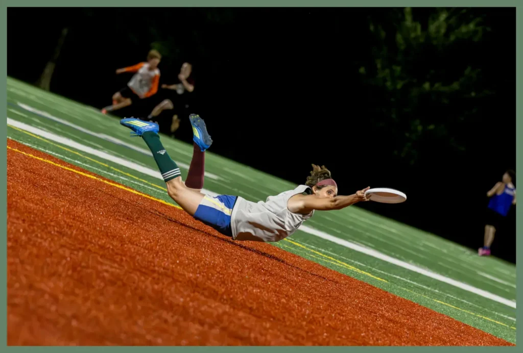 A female athlete executing a dive, captured by your sports photographer in Lyon